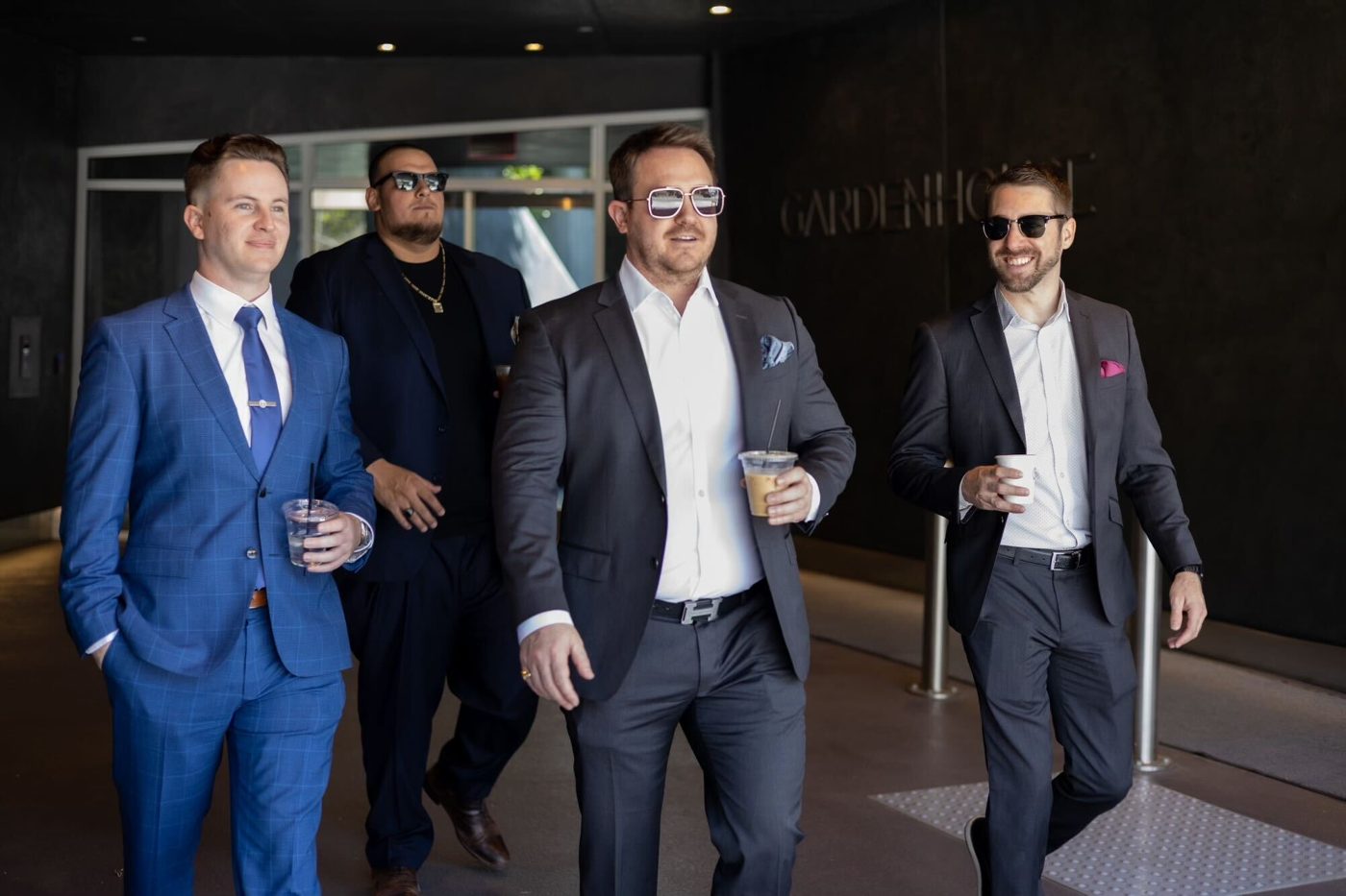 CV Organization leaders in suits outside the office